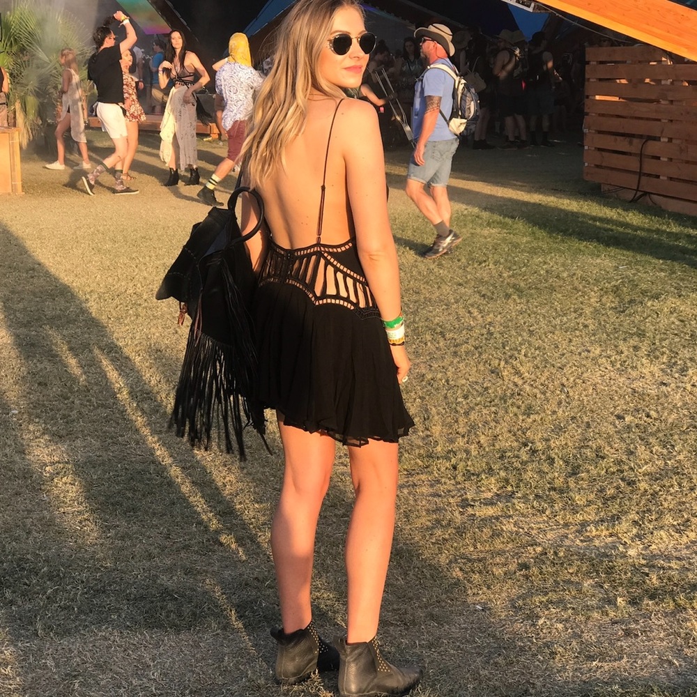 Black open back mini dress with cut out detail by magali pascal